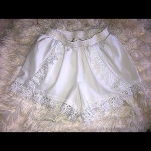 White lace shorts